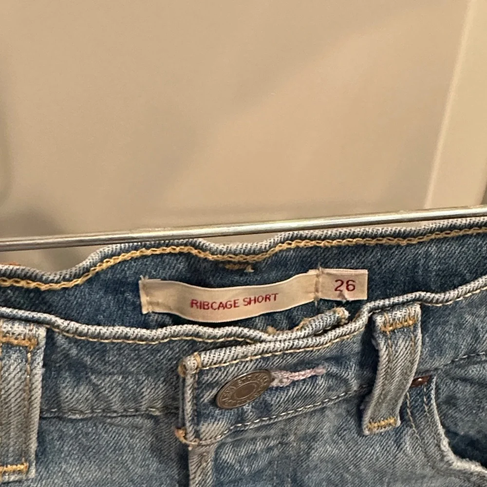 Distressed Levi’s Ribcage Denim Shorts - Picture 3 of 3